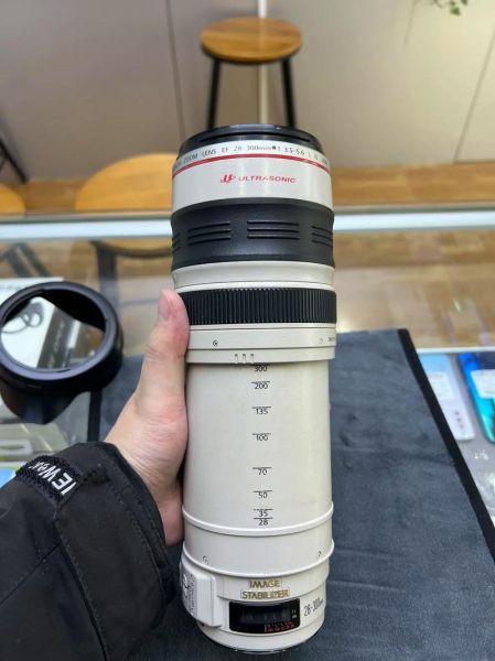 佳能28300镜头怎么样_值得买吗-第1张图片-星辰妙记